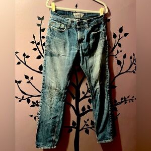 Levi’s 511 skinny jeans 32 34 zipper detail above back pockets. Women’s